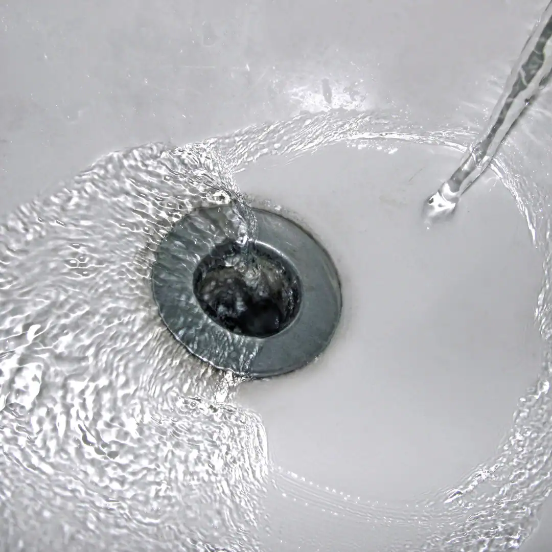 water moving down in the outlet pipe